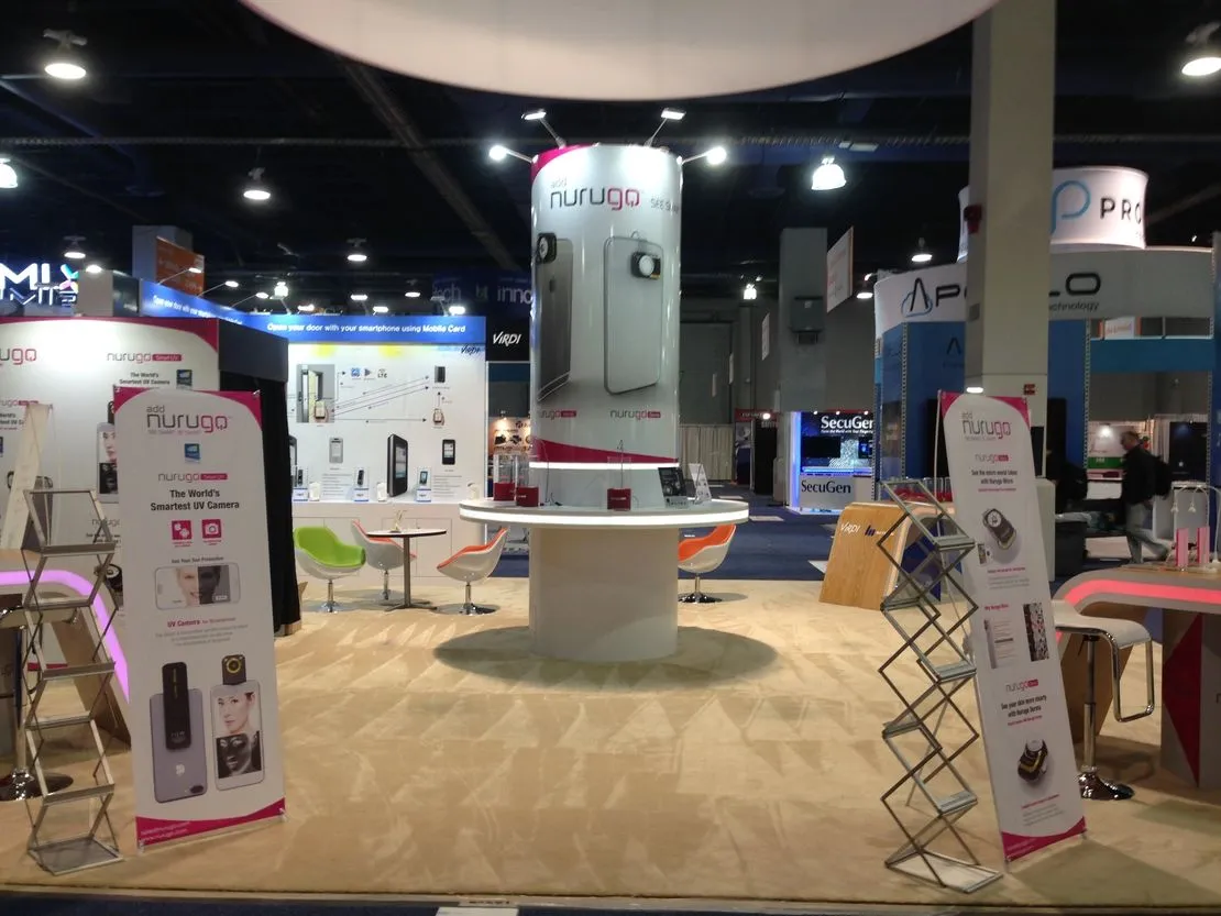 Completed Nurugo exhibit from A2’s project gallery, with a central display and open meeting areas